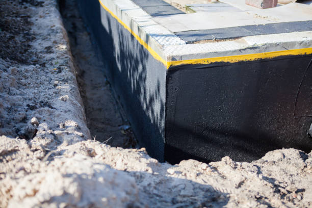 Professional Waterproofing technician working in Armada, MI